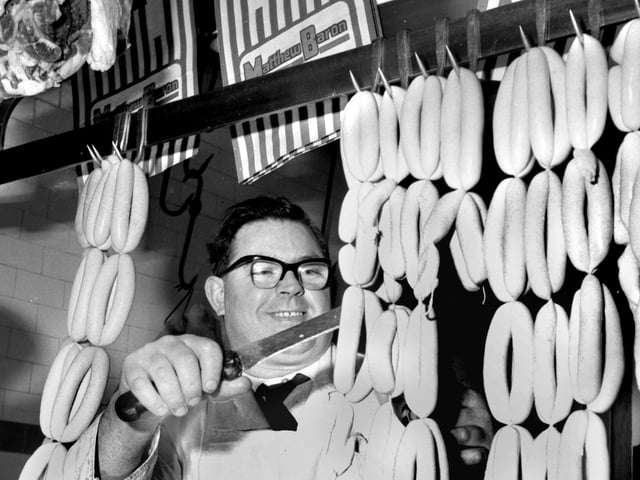 Butcher Fred Barton at work in his Wigan shop in 1969.