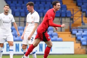 Joe Adams scored a late equaliser for Latics in the 1-1 draw at League Two Tranmere