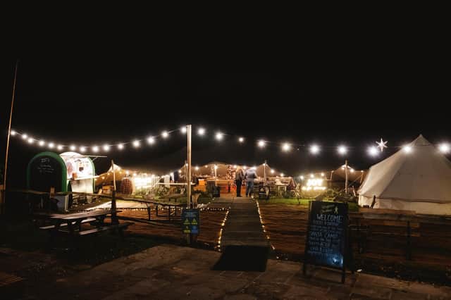 The tipi lit-up in dark winter evenings throughout December.