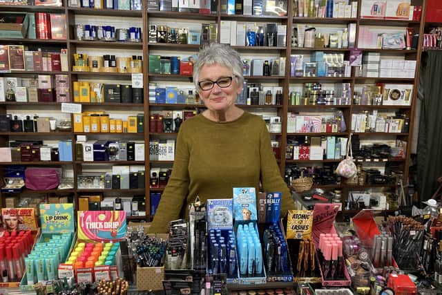 Julia Whalley, 74, at her cosmetics stall in Leigh Market