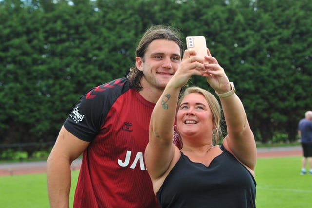 Liam Byrne has a selfie with a fan.