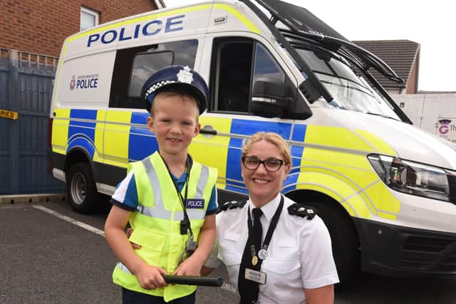 George Latham, five, with Chief Supt Emily Higham