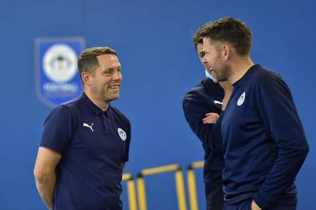 James Beattie shares a word with Leam Richardson
