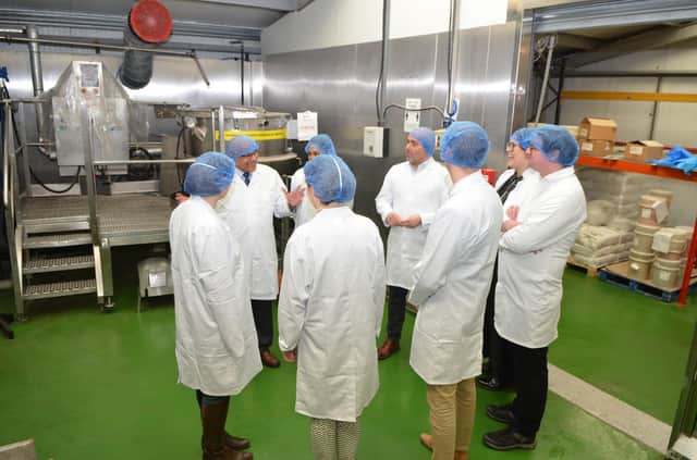 Officials from Defra get a tour of the Pasco factory on Makerfield Way, Ince