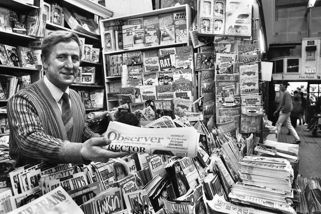 Frank Ryding on his newsagents stall in the old Wigan market hall in December 1987 just prior to closure of the building.