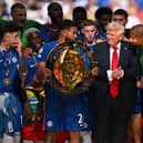 Reece James and Chelsea pick up the Club World Cup trophy