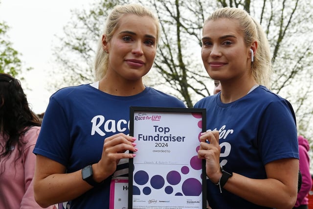 Twins Hannah and Bekah were awarded a certificate for being the top fund-raisers for the event