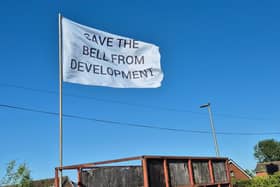 One of the many defiant flags around The Bell