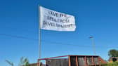 One of the many defiant flags around The Bell