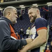 England coach Shaun Wane congratulates Elliott Whitehead after Whitehead's retirement from international rugby league