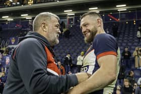 England coach Shaun Wane congratulates Elliott Whitehead after Whitehead's retirement from international rugby league