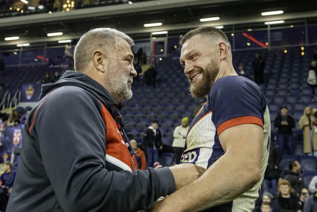 England coach Shaun Wane congratulates Elliott Whitehead after Whitehead's retirement from international rugby league