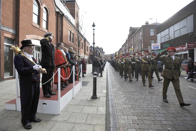 RETRO 2010 Remembrance Day Parade in Wigan after the Parish church service.
Commander Steve Waller, Mayor of Wigan Coun Mike Winstanley, Mayors Consort Coun Judith Atherton and head of Wigan Council  Joyce Redfearn take the salute from passing service personnel and veterans
