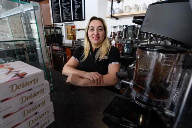 Co-owner Razia Azimeh inside Valletta Cafe