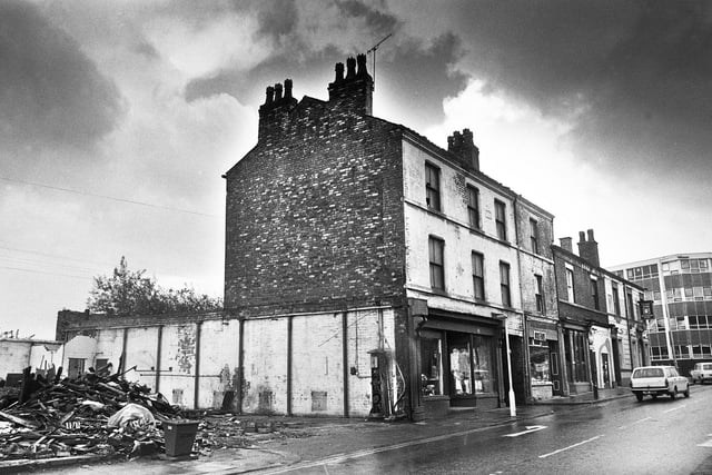 October 1980 and the demolition of shops on Darlington Street, Wigan, including the one above which George Orwell is said to have stayed whilst researching his "The Road to Wigan Pier" book. At the end of the row is the Derby Arms pub at the junction with Chapel Lane.