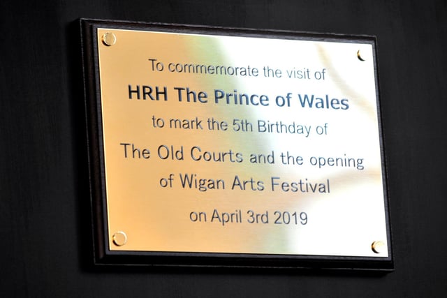 The plaque Prince Charles unveiled as HRH meets people from a variety of groups at The Old Courts, Wigan.