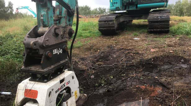Work being carried out to extinguish an underground fire on Queensway in Leigh