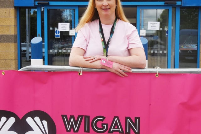 Mary Davies, carer development officer at Wigan Council, welcomes people to the festival