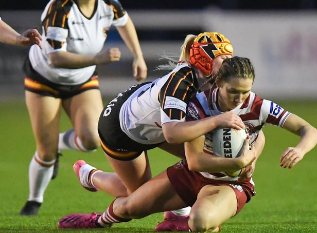 Georgia Wilson goes over for a try