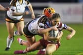Georgia Wilson goes over for a try
