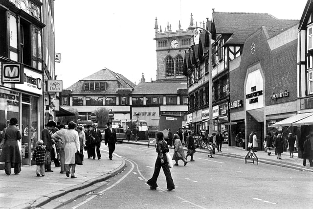 Market Place, Wigan, in the mid 1970s when Lowes store was still in existence and the out of place brick facia of The Wigan Centre Arcade caused controversy.