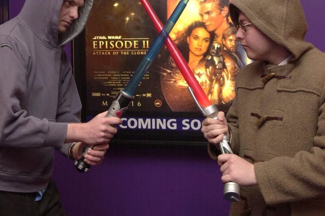 Star Wars fans and journalists David Taylor, left and Andy Williams, get in the mood for Episode II - "Attack of the Clones", at UGC Cinema