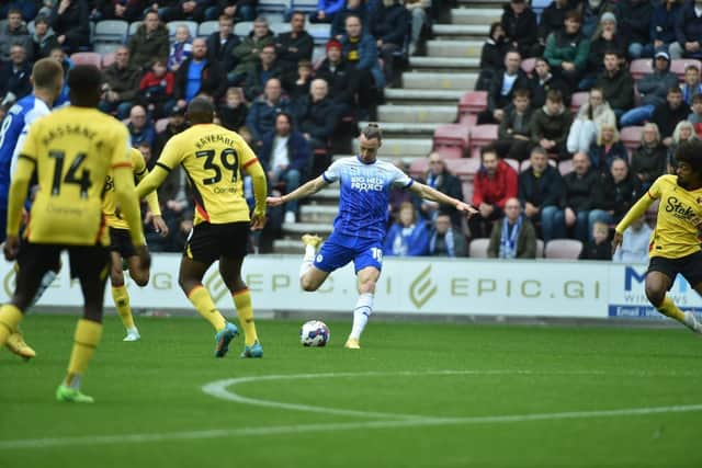 Will Keane shoots for goal against Watford