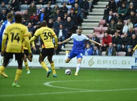 Will Keane shoots for goal against Watford