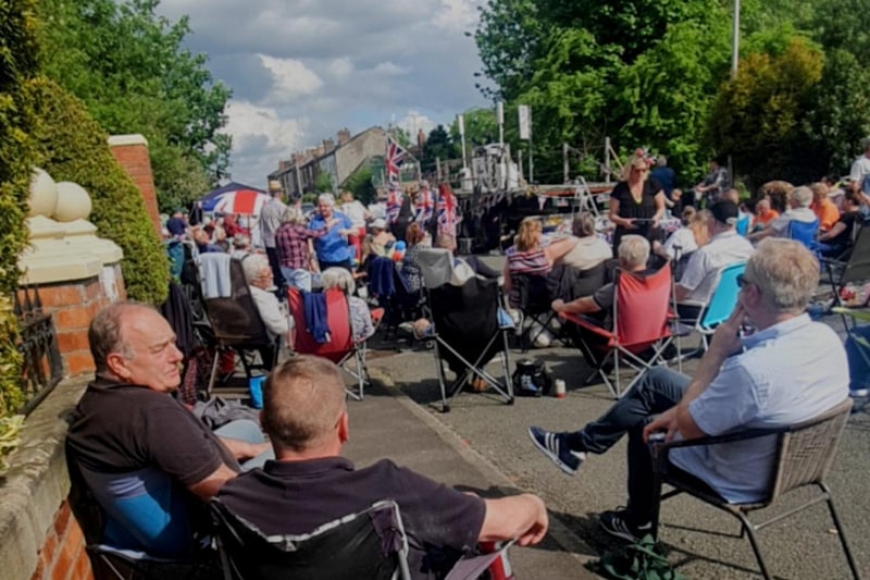 Residents on Harvey Lane, Golborne, celebrate the coronation