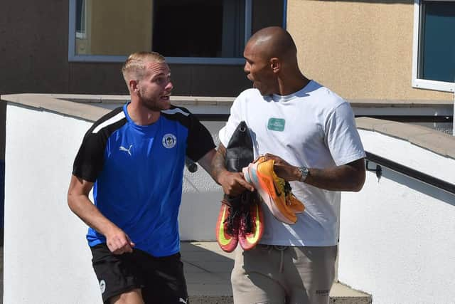 Jack Whatmough and Josh Magennis at the training ground