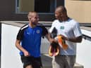 Jack Whatmough and Josh Magennis at the training ground