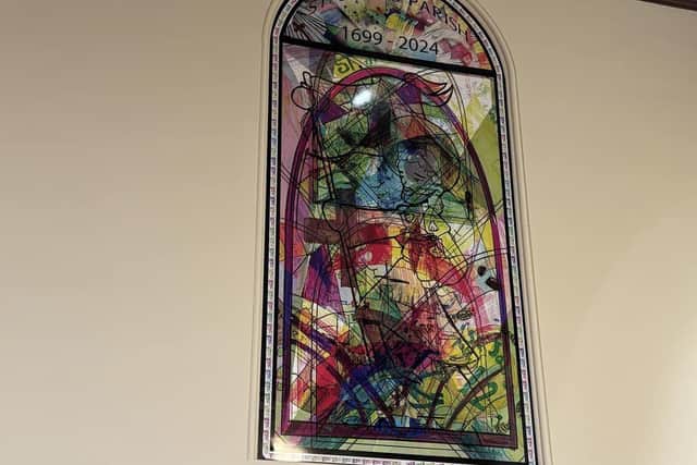 The faux stained glass window designed by pupils of St. James' Catholic Primary School