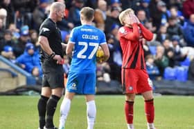 Peterborough were given renewed hope after the sending-off of Matt Smith in the final quarter