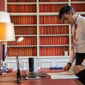 Rishi Sunak with his £180 'smart mug' (credit Simon Walker HM Treasury PA)