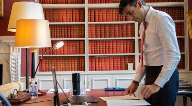 Rishi Sunak with his £180 'smart mug' (credit Simon Walker HM Treasury PA)