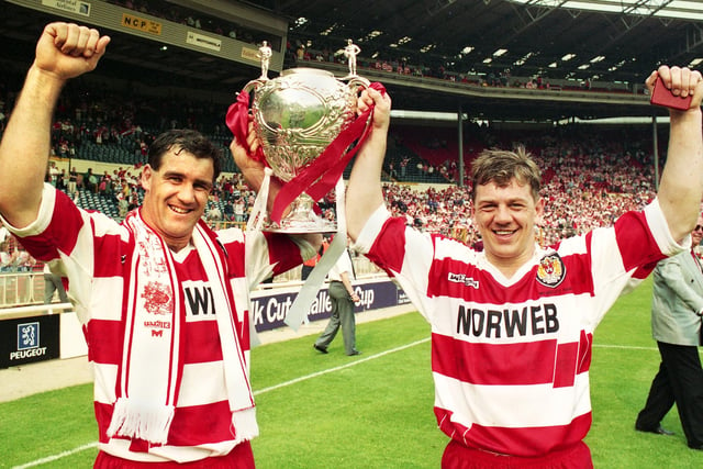 Andrew Farrar and Steve Hampson show off the trophy after beating Widnes 20-14 in the Challenge Cup Final at Wembley on Saturday 1st of May 1993.