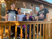 Jessica Atherton and her family at a new woodland counselling hub at Derian House