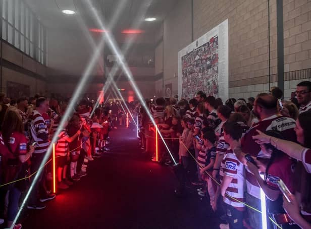 The Wigan Warriors players will walk through the fan village ahead of Sam Powell's testimonial game