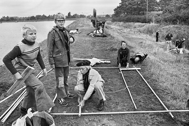 Wigan scout troops building rafts ready to float on Orrell Reservoirs during one of the first raft racing events in October 1975. 
