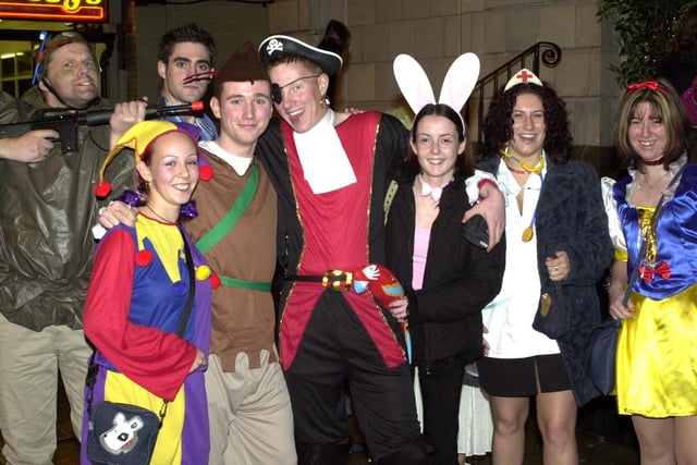 Colourful characters in King Street for the traditional Boxing Day fancy dress night in 2003
