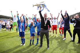 Leam Richardson celebrates winning the League One title last term