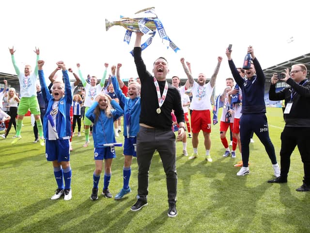 Leam Richardson celebrates winning the League One title last term
