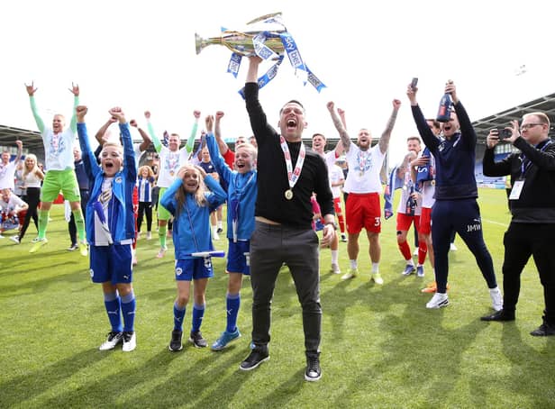 Leam Richardson celebrates winning the League One title last term