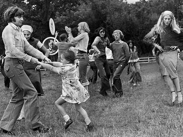 Dancing to the music at the July Wakes Folk Festival at Park Hall, Charnock Richard, on Saturday 24th of July 1976.