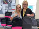 Maureen Holcroft, from Daffodils Dreams, right, with the backpacks