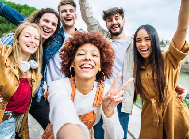 <p>The body language we display in photographs can reveal much about us  (photo: Adobe)</p>