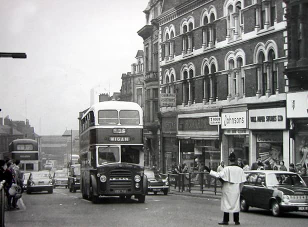 Ashton's tobacconists, Howard's pram shop, Johnson's dry cleaners and Wall Paper Stores.