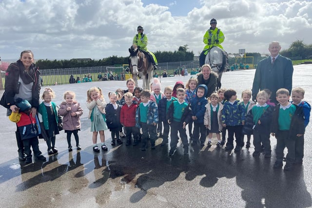 Pupils meet the Mounted Police.