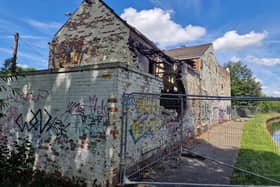 The towpath at the back of the former Monsoon restaurant has been blocked off to walkers