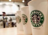 Starbucks coffee cups (Photo by Stephen Chernin/Getty Images)